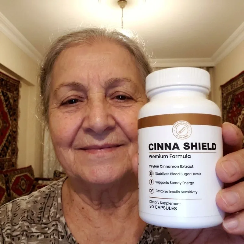 Cinna Shield customer holding their bottle