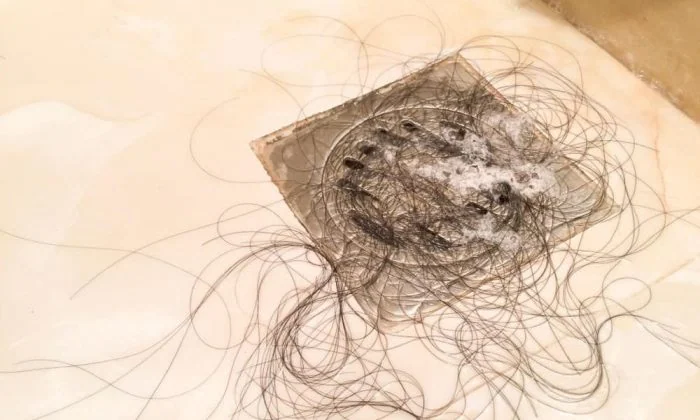 Hair clogging the shower drain